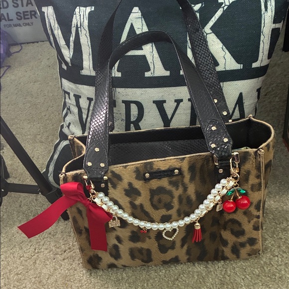 kate spade Handbags - Kate Spade Leopard Print Tote with Black Handles and bag charm EUC